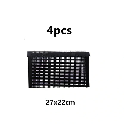 Black grill mesh bag with non-stick grid mat for BBQ cooking showing smoke-through design