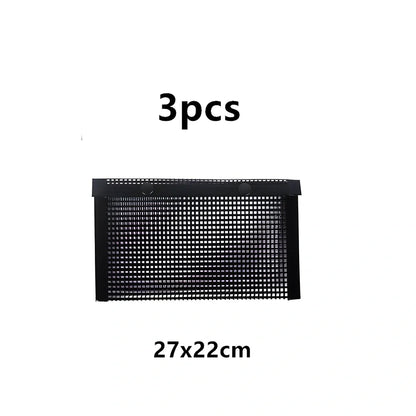 Black grill mesh bag with non-stick grid mat for BBQ cooking showing smoke-through design
