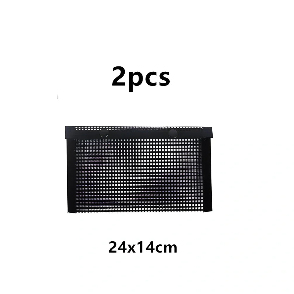 Black grill mesh bag with non-stick grid mat for BBQ cooking showing smoke-through design