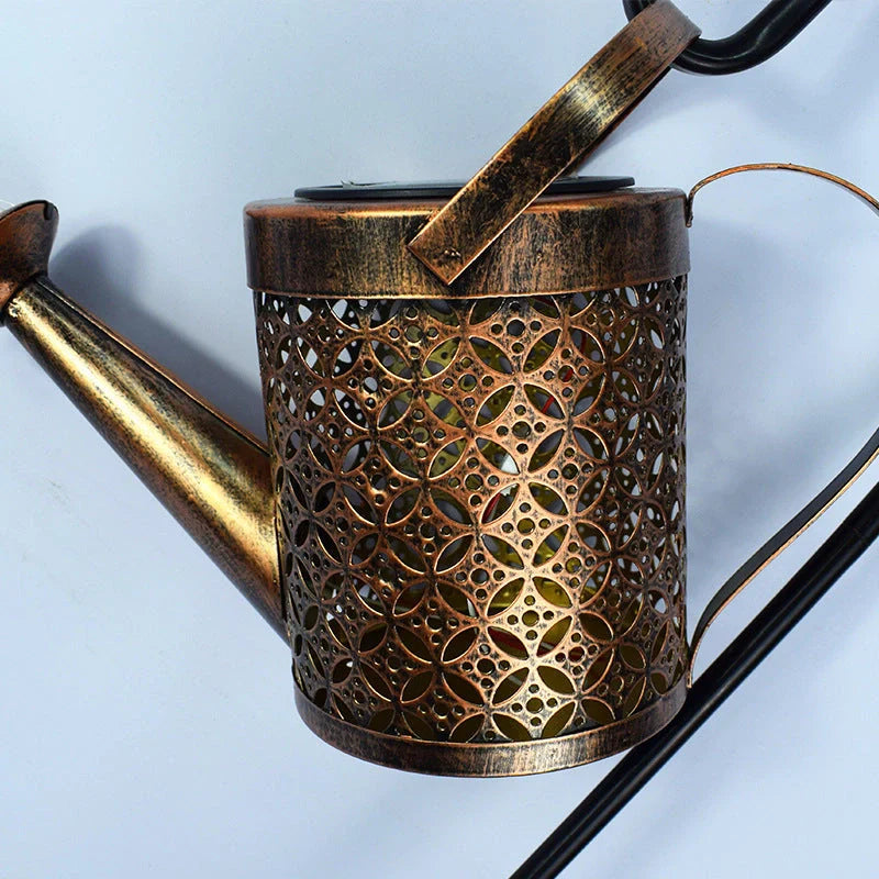 Solar-powered Enchanted Watering Can Garden Light with LED lights and hollow-out iron design