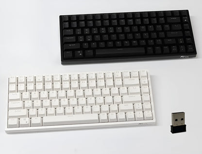 84-key three-mode mechanical keyboard with hot-swappable switches in black or white case