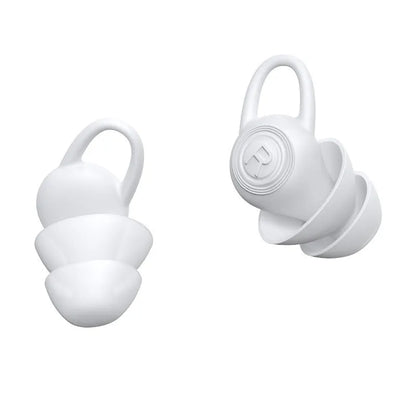 A single pair of smooth white silicone ear plugs for noise reduction.