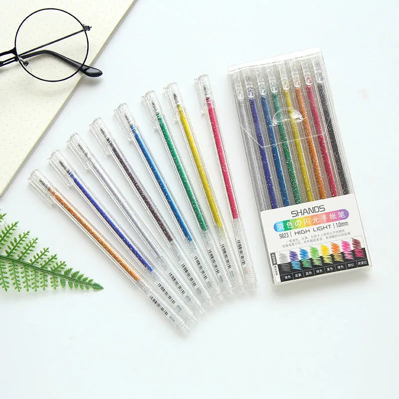 Box of eight Shanzhi 623 plastic flashing account pens with colour changing LED lights, 16 cm long.