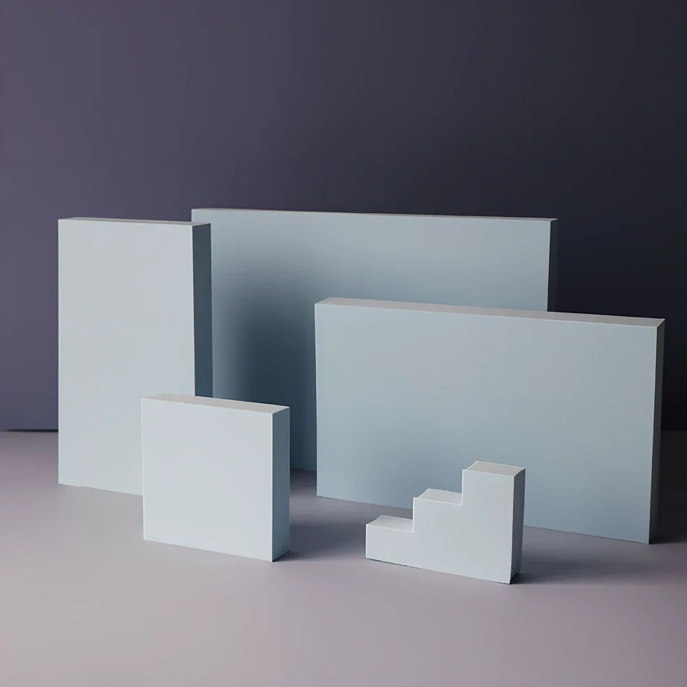 Set of white round and square plastic props for cosmetics shooting, 10cm diameter rounds and 8cm squares for stable product displays