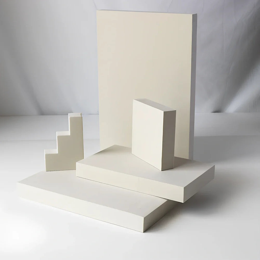 Set of white round and square plastic props for cosmetics shooting, 10cm diameter rounds and 8cm squares for stable product displays