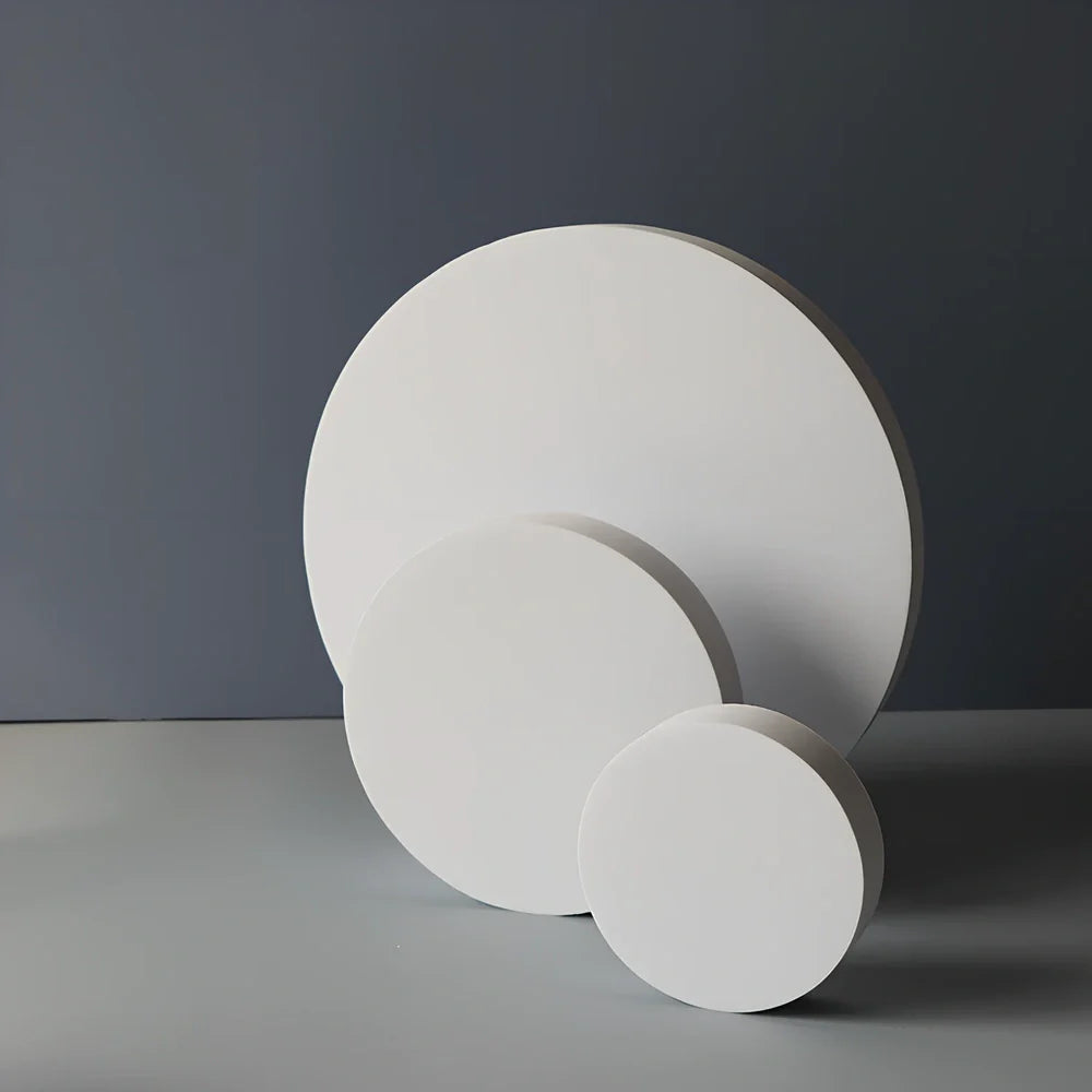 Set of white round and square plastic props for cosmetics shooting, 10cm diameter rounds and 8cm squares for stable product displays