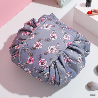 Stylish and roomy makeup travel bag with multiple color options, featuring a spacious interior and drawstring closure for secure storage of beauty essentials.