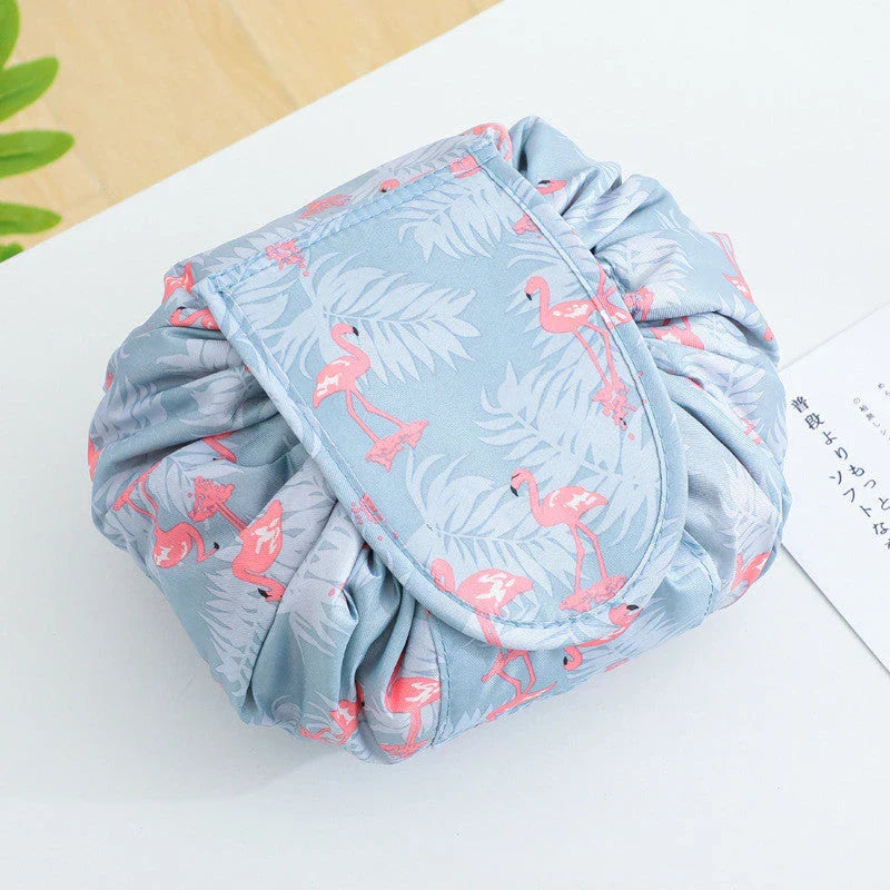 Stylish and roomy makeup travel bag with multiple color options, featuring a spacious interior and drawstring closure for secure storage of beauty essentials.