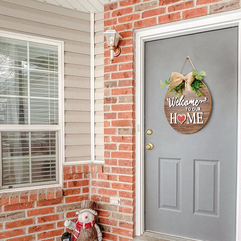Rustic wooden door hanger with interchangeable seasonal plaques in a variety of holiday and home decor designs