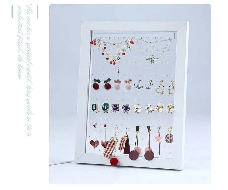 Minimalist wood and acrylic jewelry organizer with LED lighting for displaying and storing earrings, necklaces, and other jewelry