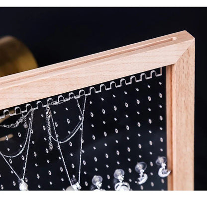 Minimalist wood and acrylic jewelry organizer with LED lighting for displaying and storing earrings, necklaces, and other jewelry