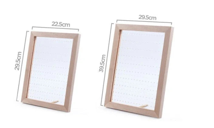 Minimalist wood and acrylic jewelry organizer with LED lighting for displaying and storing earrings, necklaces, and other jewelry