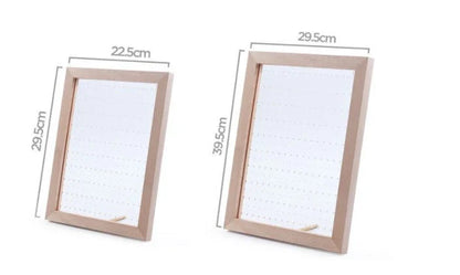 Minimalist wood and acrylic jewelry organizer with LED lighting for displaying and storing earrings, necklaces, and other jewelry