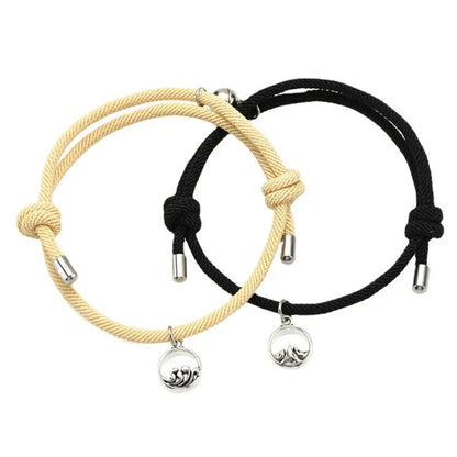 Magnetic couple's bracelet with geometric design and meaningful charms inspired by ancient Chinese tradition
