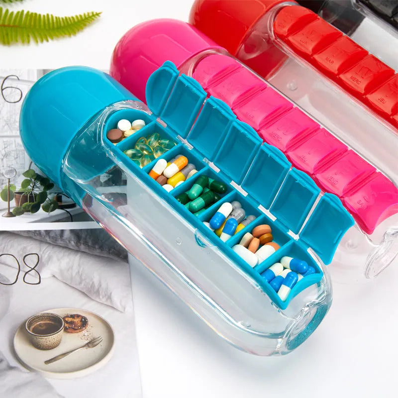 Water bottle with seven pill compartments attached, showing 600ml capacity and BPA-free construction