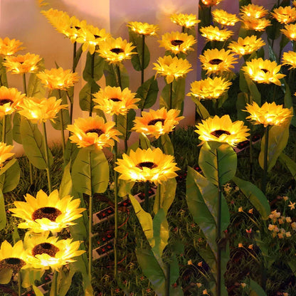 Elegant solar-powered sunflower lamps illuminating a serene outdoor garden pathway