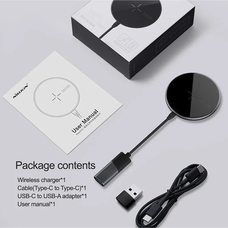 Black MagSlim magnetic wireless charger for iPhone on a flat surface