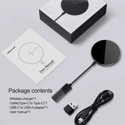 Black MagSlim magnetic wireless charger for iPhone on a flat surface