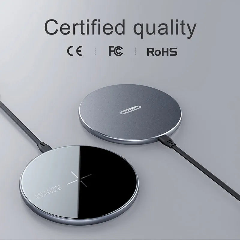 Black MagSlim magnetic wireless charger for iPhone on a flat surface