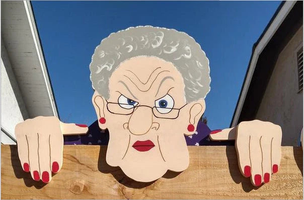 Charming garden fence decorations featuring quirky depictions of curious older adults