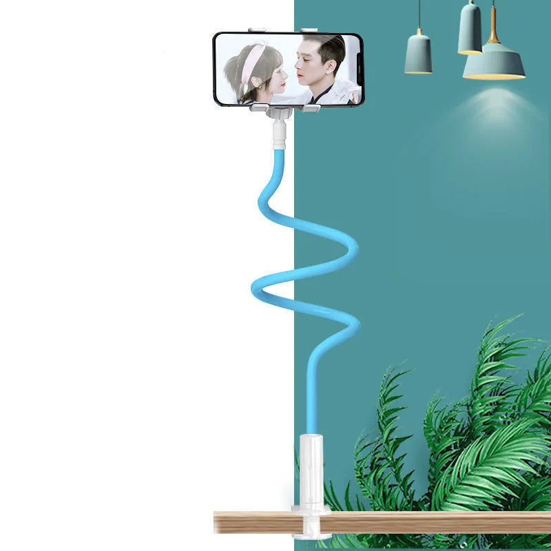 Flexible memory alloy mobile phone holder in blue colour positioned beside a bed