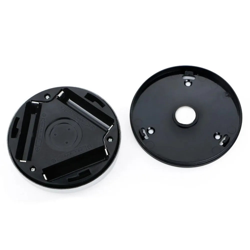 Silver square wireless motion sensor night light on a wall, 80mm wide, showing LED illumination.