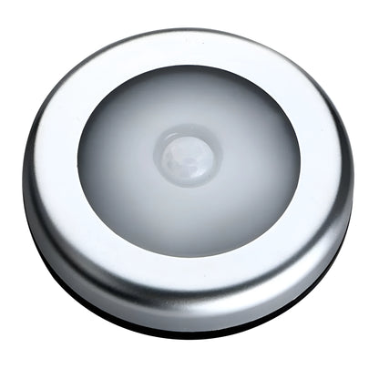 Silver square wireless motion sensor night light on a wall, 80mm wide, showing LED illumination.