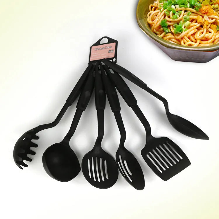 Black rubber kitchen utensil set with spatula spoon for non-stick cookware protection