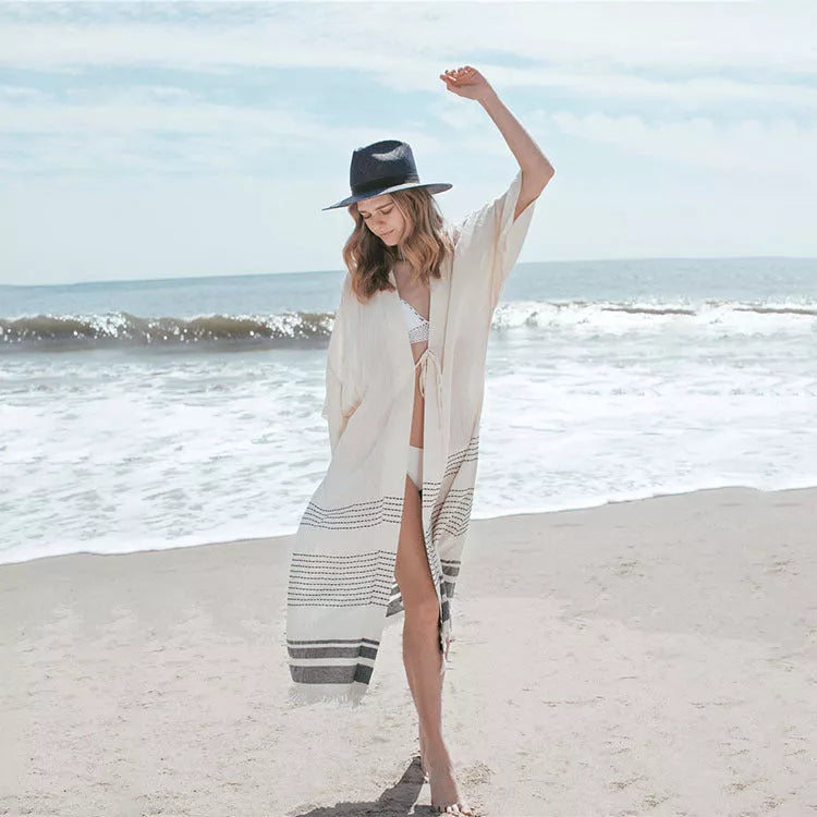 White crochet knitted beach pareo dress with long tunic design and tassels