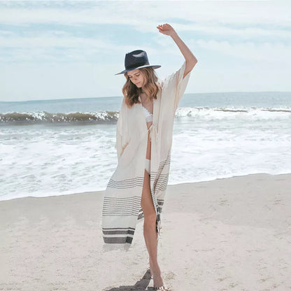 White crochet knitted beach pareo dress with long tunic design and tassels