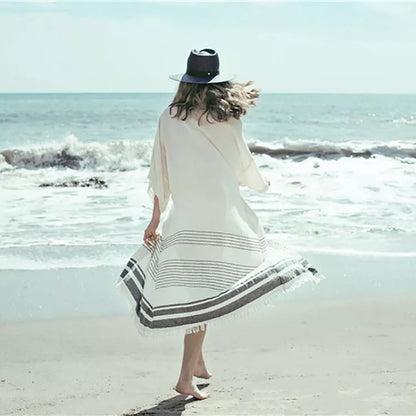 White crochet knitted beach pareo dress with long tunic design and tassels