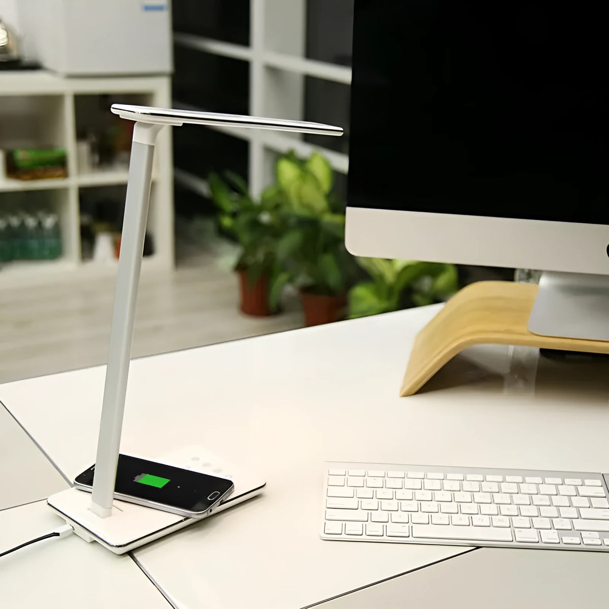 Black and white wireless charging LED desk lamp with USB cable and touch control.