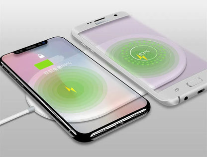 White dual phone wireless charging pad for simultaneous fast charging of two mobile phones