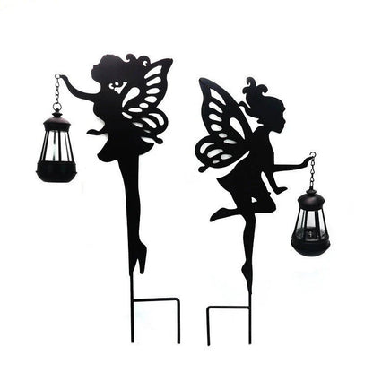 Solar-powered outdoor garden light with wrought-iron fairy lantern design, perfect for illuminating pathways, patios, and landscapes.