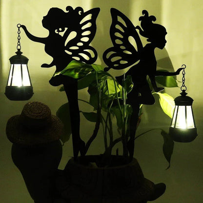Solar-powered outdoor garden light with wrought-iron fairy lantern design, perfect for illuminating pathways, patios, and landscapes.