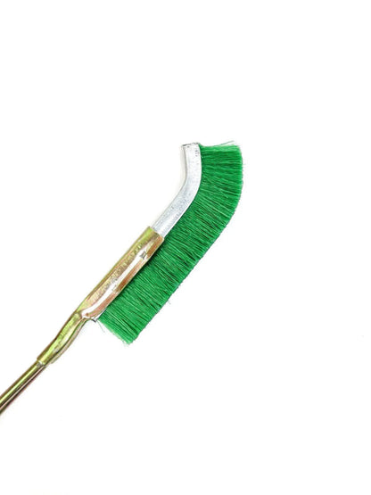 Green-handled mini elbow brush for rust removal on metal surfaces and range hood cleaning