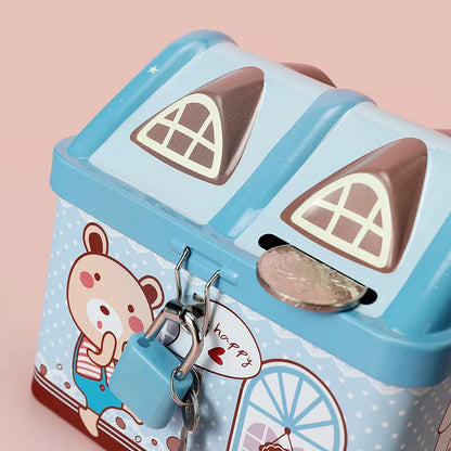 Blue tinplate house-shaped piggy bank with coin slot on round base