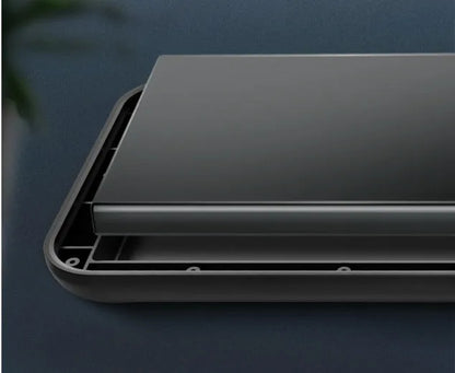 Black ultra-thin TPU back clip battery pack for iPhone 12 with wireless charging showing compact size.