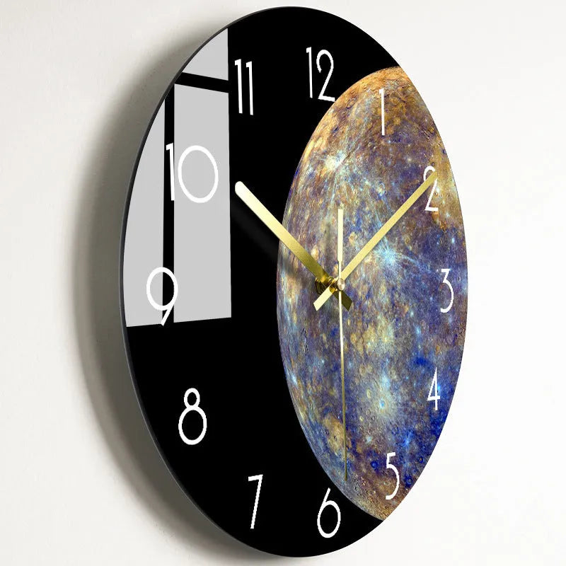 Round silent wall clock with acrylic glass dial, shown in a living room setting.