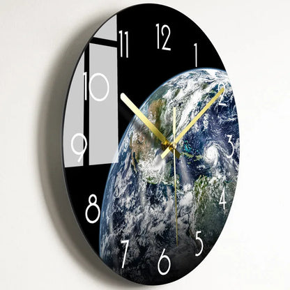 Round silent wall clock with acrylic glass dial, shown in a living room setting.