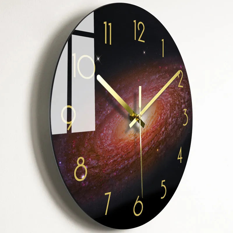 Round silent wall clock with acrylic glass dial, shown in a living room setting.