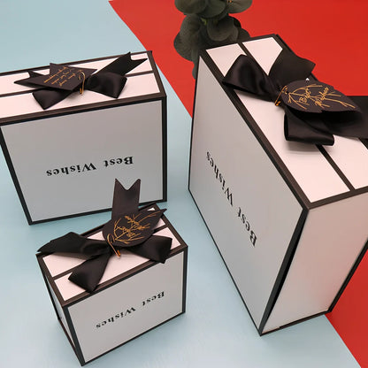 White square clamshell paper gift box for cosmetics, sizes 12-21cm with raffia and bag options