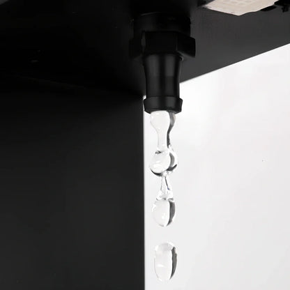 Obsidian black anti-gravity floating sand drop table lamp with geometric hourglass and LED glow