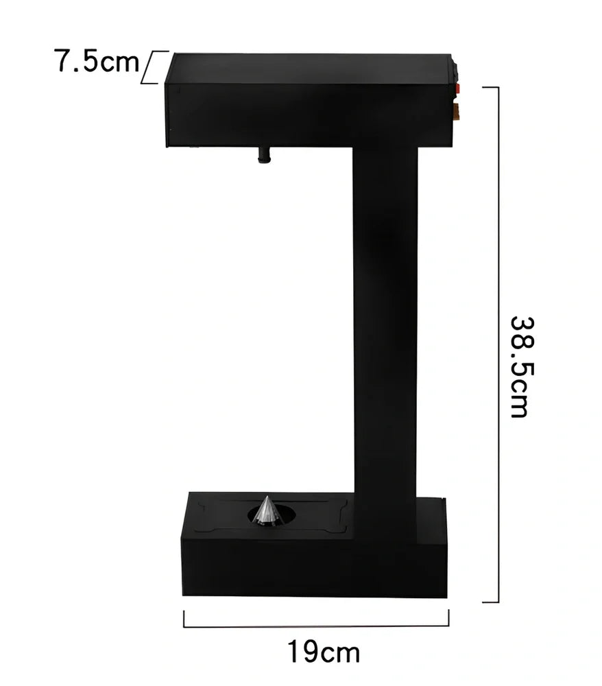Obsidian black anti-gravity floating sand drop table lamp with geometric hourglass and LED glow