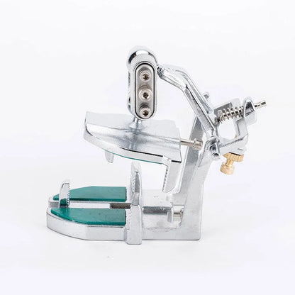 Korean dental laboratory articulator with three adjustable hinges for jaw motion simulation.