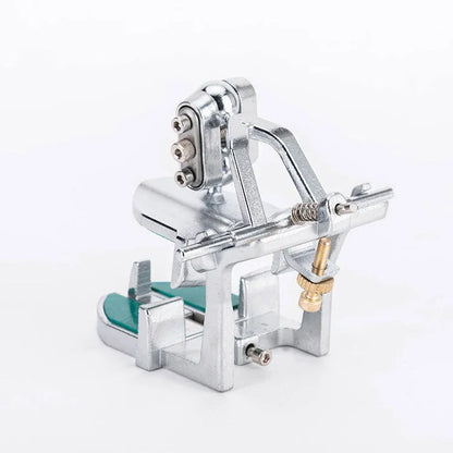 Korean dental laboratory articulator with three adjustable hinges for jaw motion simulation.