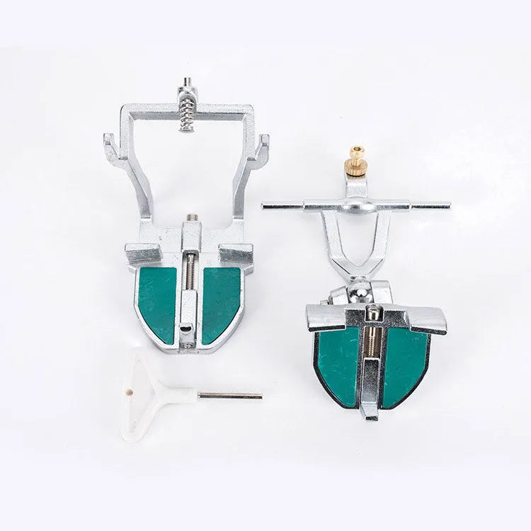 Korean dental laboratory articulator with three adjustable hinges for jaw motion simulation.