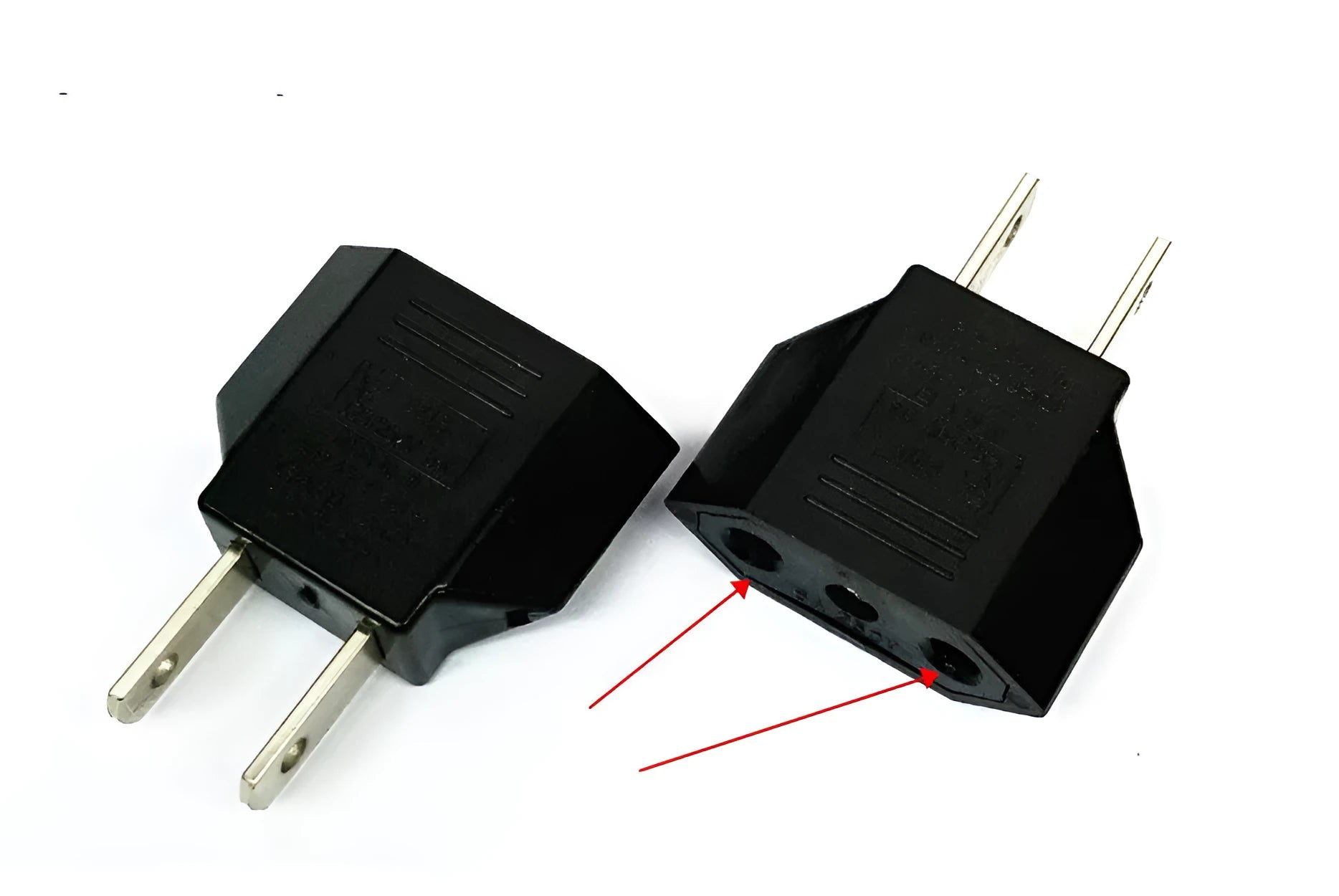 Black and white travel power adapter with three AC sockets showing AU EU US plug options
