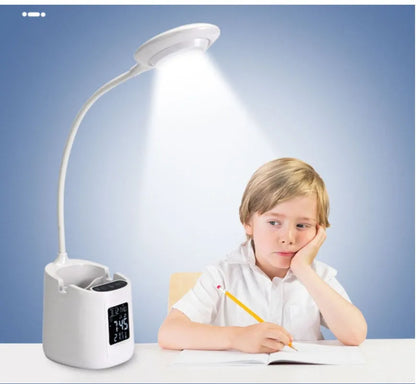 White USB desk lamp with touch switch on a dormitory desk.
