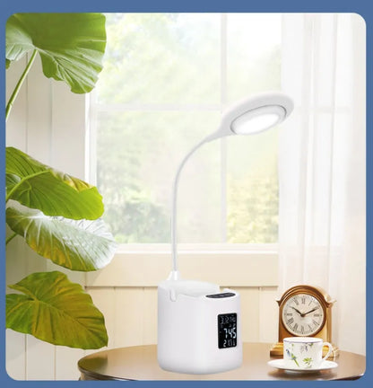 White USB desk lamp with touch switch on a dormitory desk.